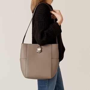 Time’s Arrow leather tote bag